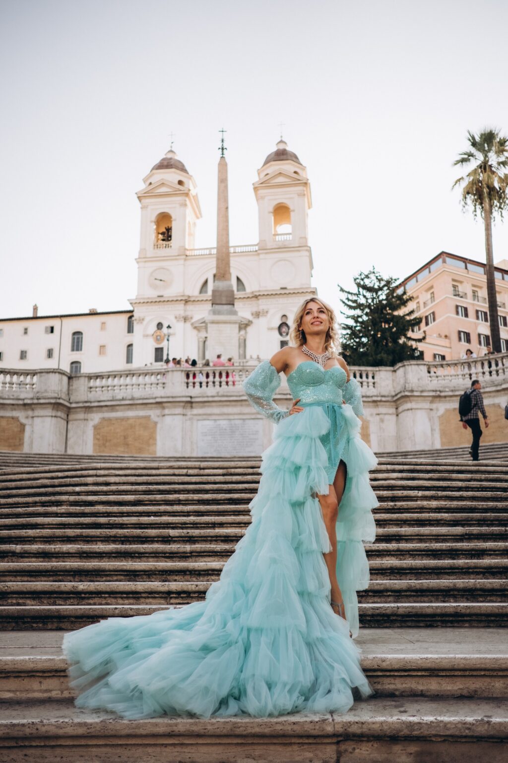 Solo flying dress portrait on the Spanish Steps, mint tulle gown with a long train