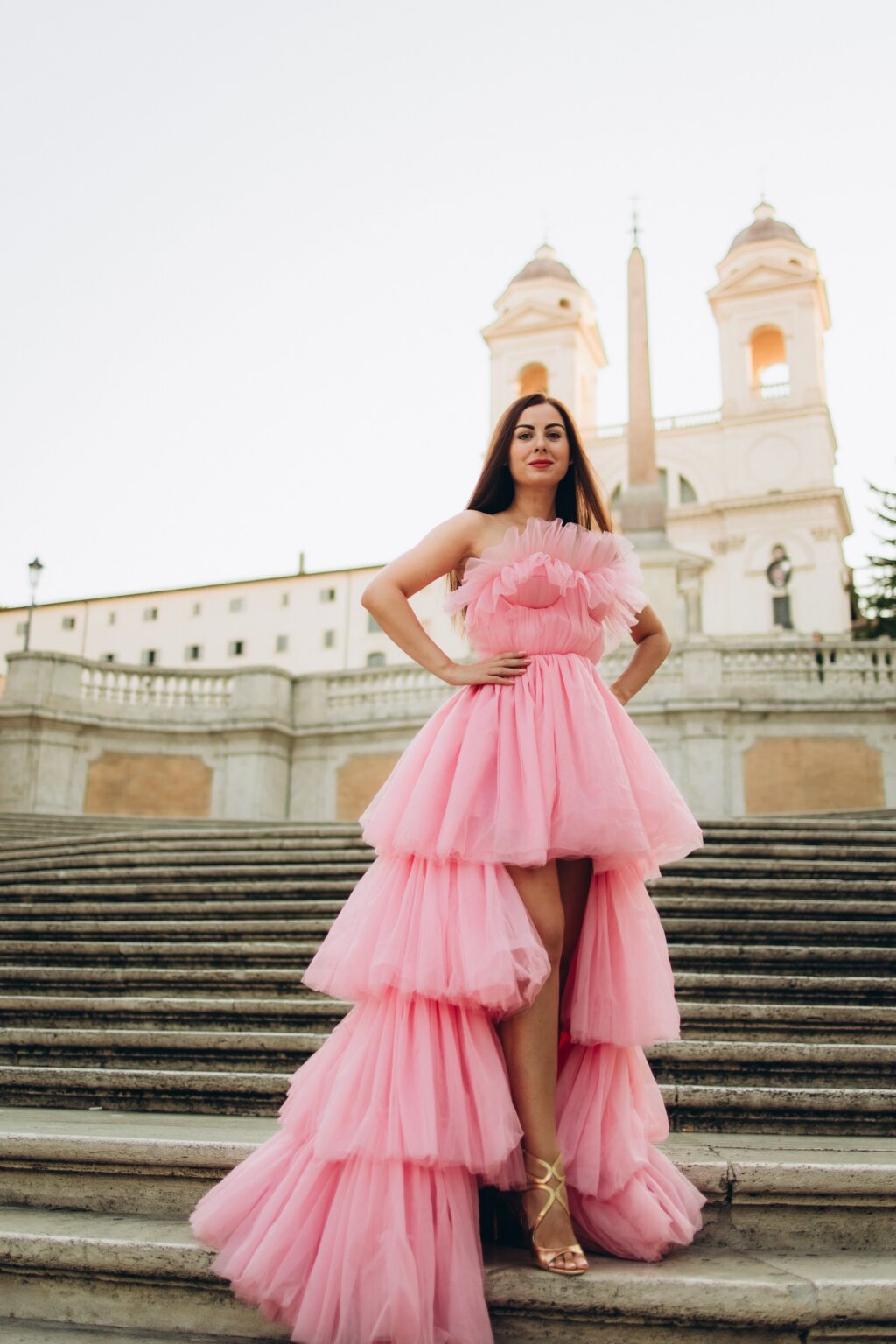 Pink tiered tulle dress on the Spanish Steps in Rome