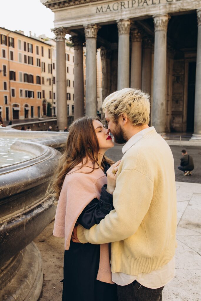 Couple by the fountain in front of the Pantheon in spring