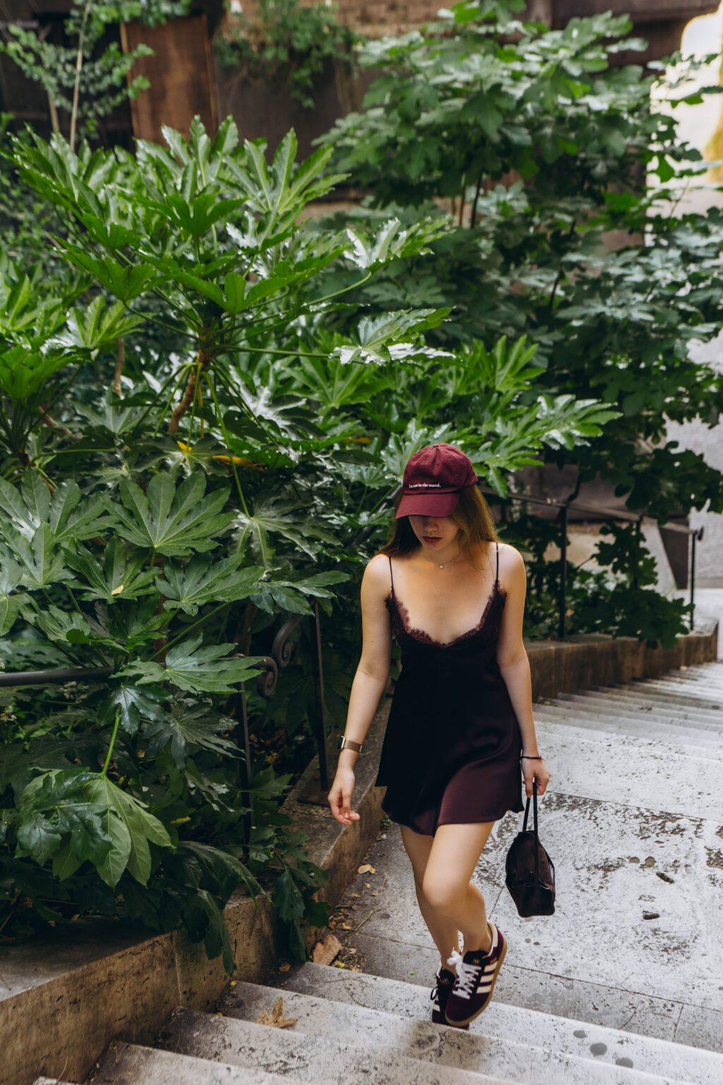 Walking down leafy steps from the Capitoline Hill