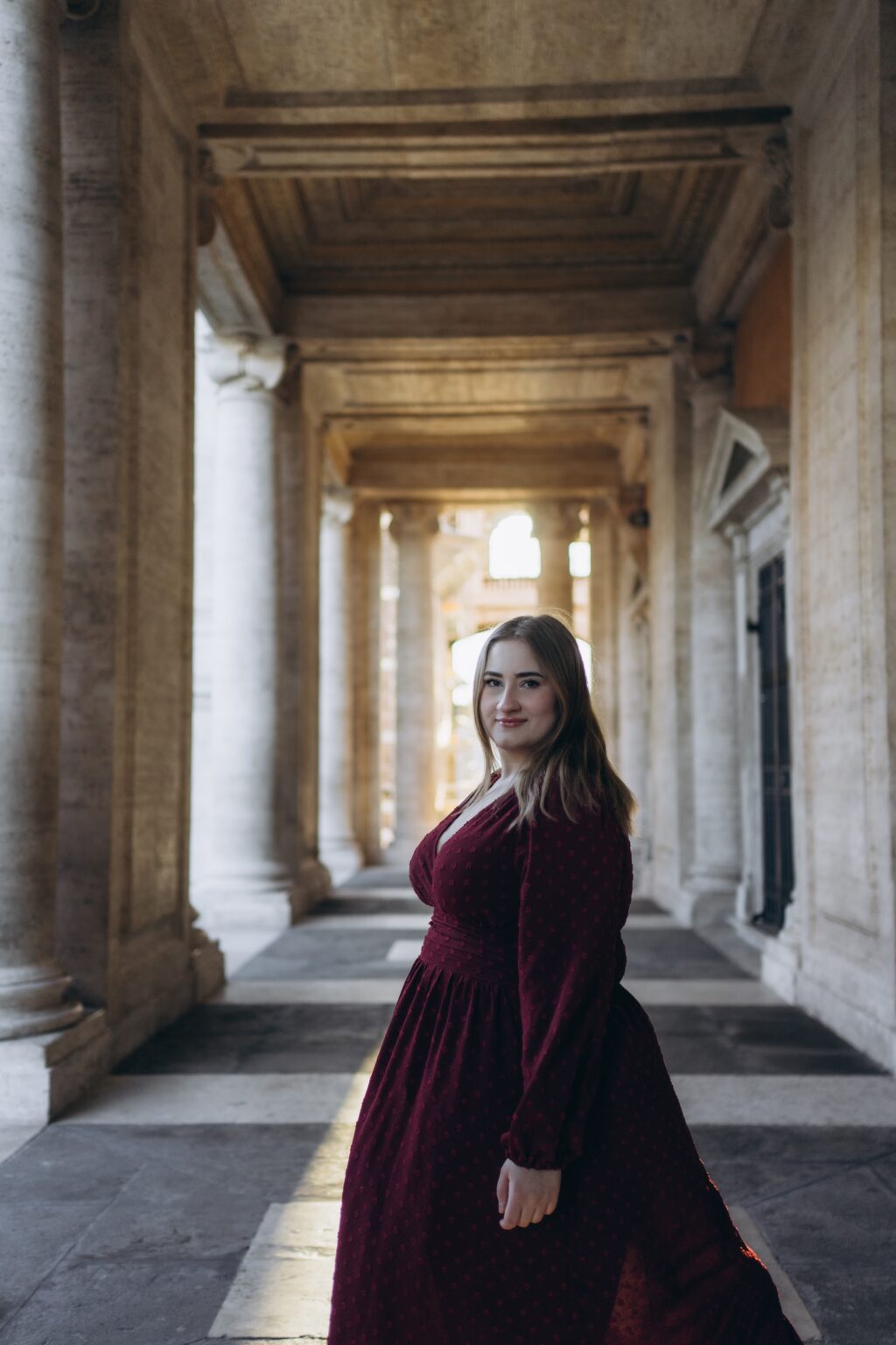 Standing in low November light in the Capitoline colonnade