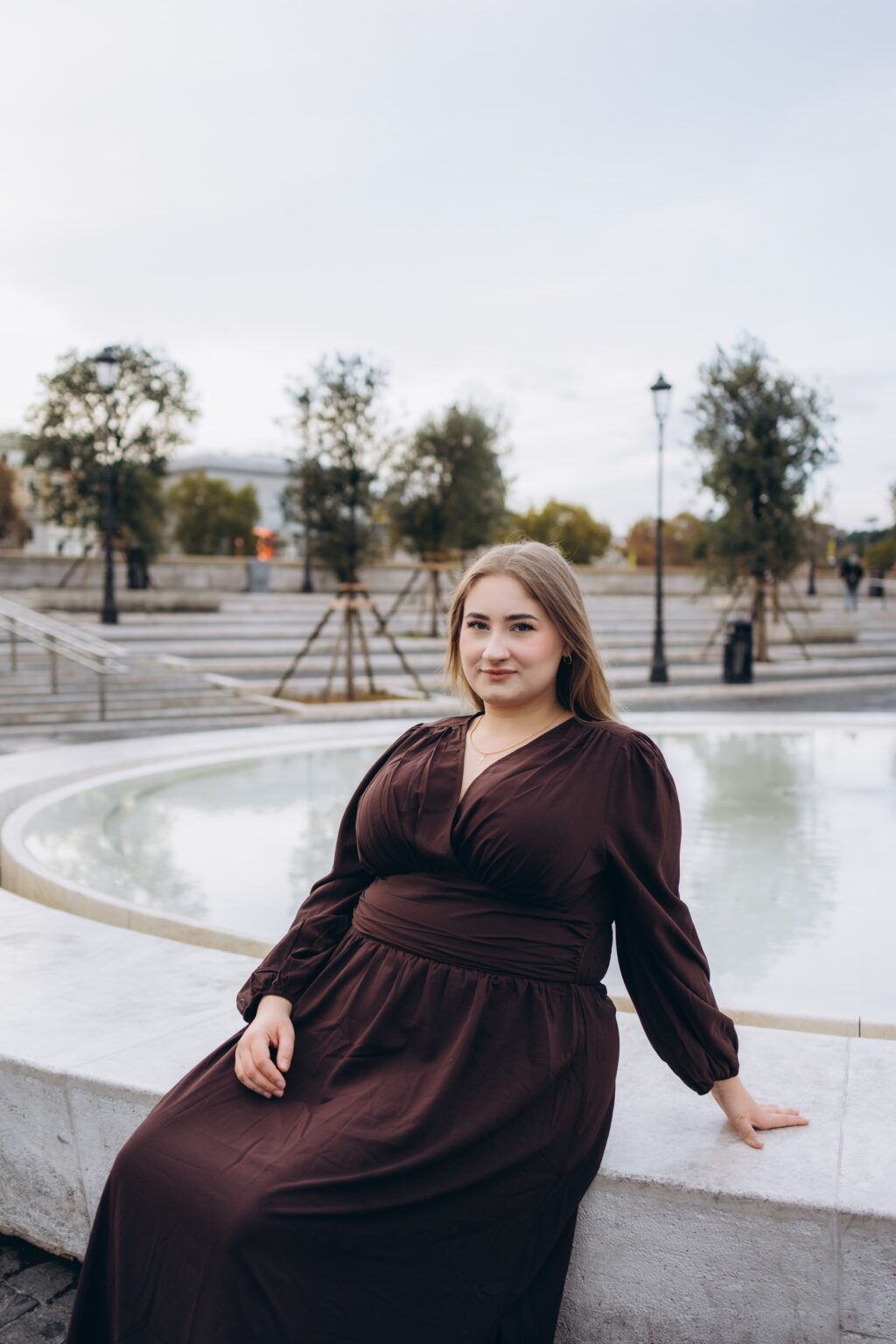 Portrait by a fountain near the Vatican on a November morning