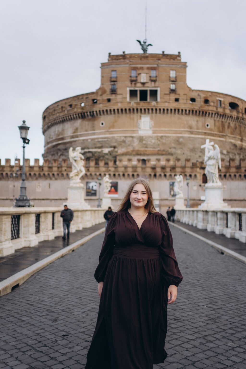 Portrait on Ponte Sant'Angelo with Castel Sant'Angelo behind, November