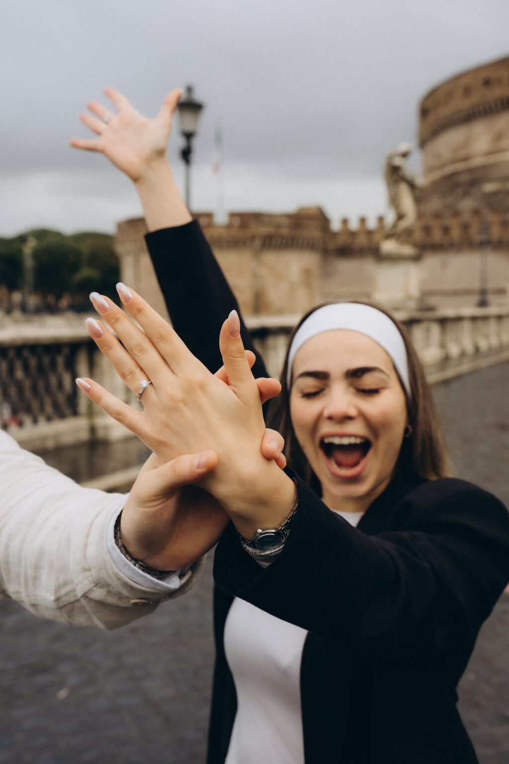 She said yes: showing the ring by Castel Sant'Angelo