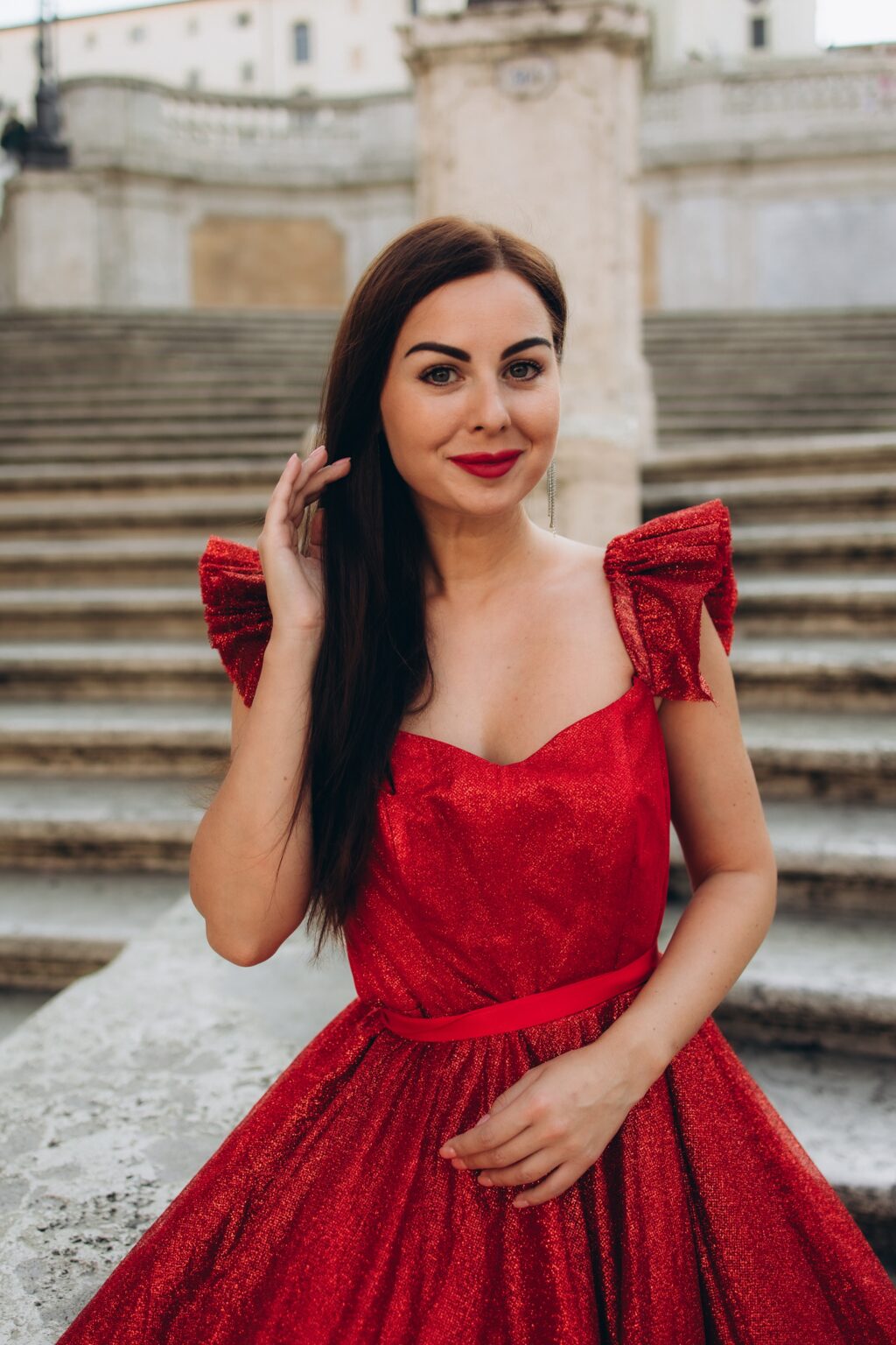 Solo photoshoot in a red gown on the Spanish Steps