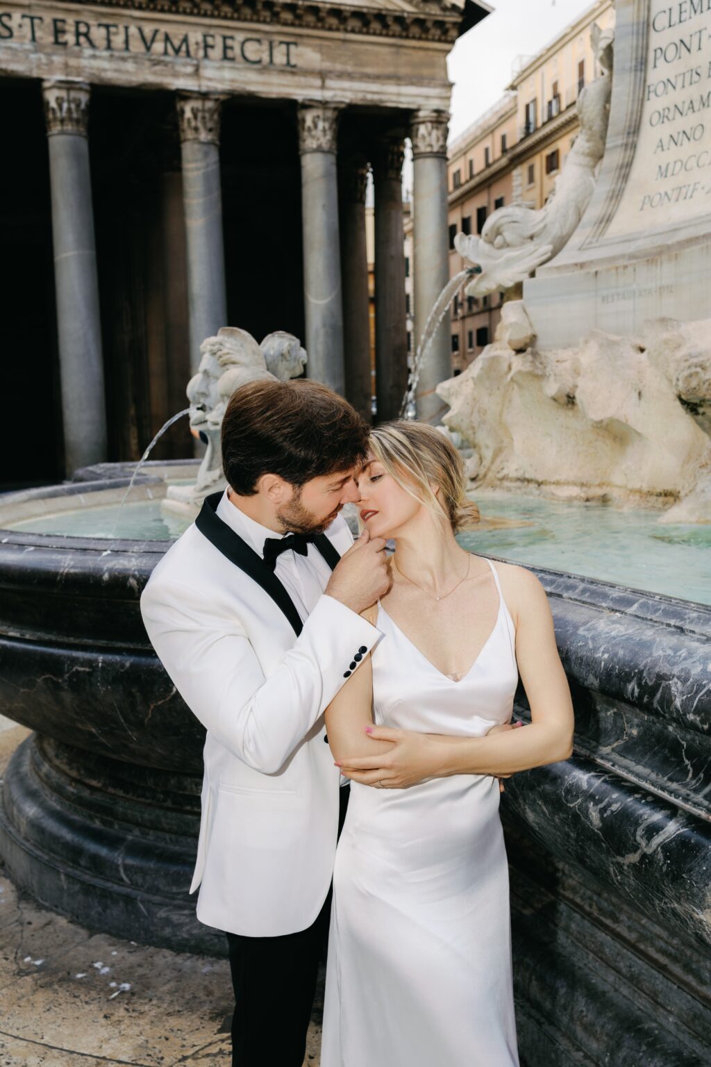 Bride and groom at the Pantheon fountain in Rome